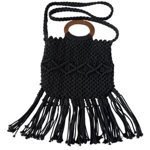 Danielle Nicole Bag
Black macrame crossbody bag w/ wooden ring and tassels.